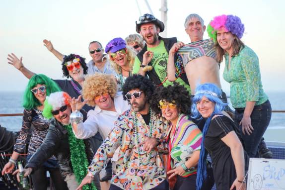 Nossos guias preparados para uma 'Festa da Fantasia' no trecho entre Buenos Aires e as Ilhas Malvinas (foto de Marla Barker)